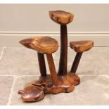 A naturalistic yew wood urn or plant stand in the style of Reynolds of Ludlow, the three shaped