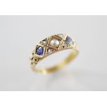 A Victorian pearl, sapphire and diamond set 15ct gold ring, comprising a central half-pearl