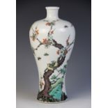 A Chinese porcelain vase, Kangxi style, the meiping shaped vase decorated in a famille verte