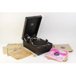 A cased His Master's Voice (HMV) wind-up portable gramophone retailed by Harrods, set number