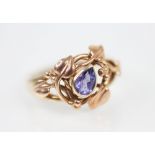 A 14ct Clogau gold tanzanite set ring, the central mixed pear cut tanzanite measuring 6mm x 4mm, set