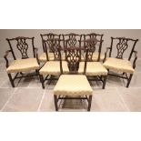 A set of eight Chippendale style mahogany dining chairs, early 20th century, each with an interlaced