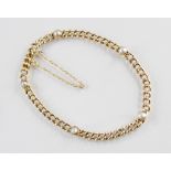 An Edwardian yellow metal pearl set bracelet, the curb link chain set with five cultured half