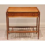 A Danish style teak side or console table, circa 1960, the suspended table top with a three