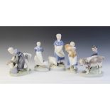 Five Royal Copenhagen figures, each modelled as a children working on a farm, comprising: a boy