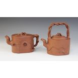 Two Yixing pottery teapots and covers, 19th/20th century, each moulded with vines, one with twist