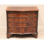 A Chinese Chippendale revival serpentine mahogany chest of drawers, early 20th century, retailed