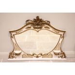 A 19th century French white painted and gilt gesso overmantel mirror, with gilt trellis and floral