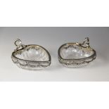 A pair of late 19th century German silver mounted cut glass bon-bon dishes, the heart-shaped glass