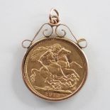 A George V gold sovereign, dated 1912, within attached soldered mount, stamped ?9ct?, gross weight