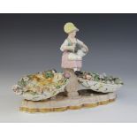 A Stevenson & Hancock Derby figural double potpourri, late 19th century, modelled as two florally