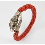 A Victorian coral snake bracelet, the head and tail with scale effect decoration, red pastes set