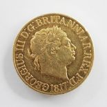 A George III gold sovereign, dated 1817, gross weight approx. 8gms