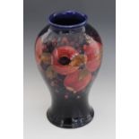 A Moorcroft vase of large proportions, early 20th century, of inverted baluster form, decorated in
