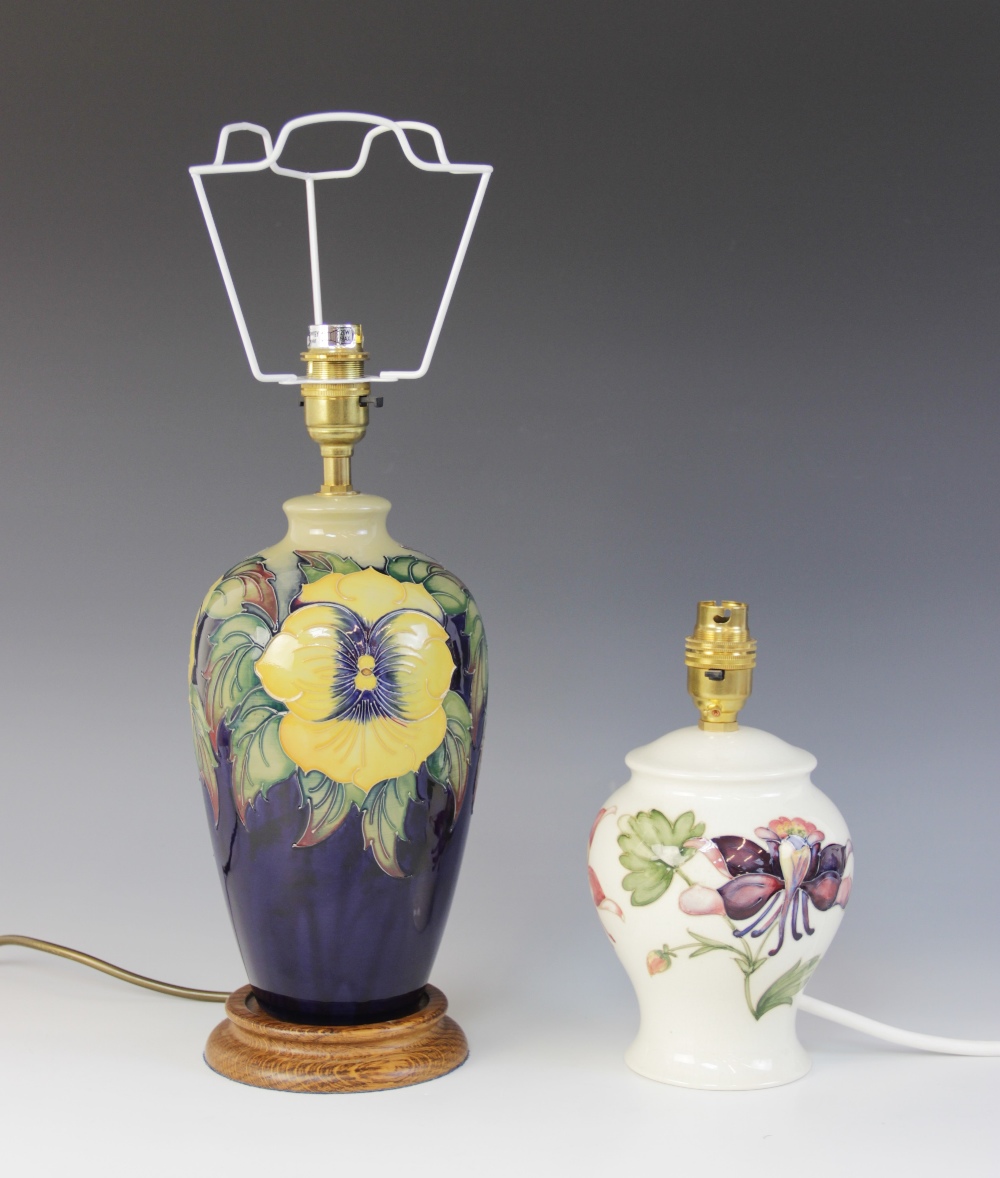 A Moorcroft table lamp, of tapering high shouldered form, decorated in a yellows pansies pattern