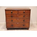 A 19th century mahogany chest of drawers, the rectangular top with a reeded edge over two short