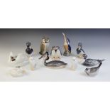 Twelve Royal Copenhagen bird models, comprising: an owl (model 2999), 14.5cm high, a swan and cygnet