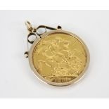 A George V sovereign, dated 1911, set to a 9ct gold pendant mount, weight 9.4gms