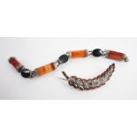 A Victorian hardstone bracelet, comprising four faceted agate links interspersed by three oval