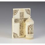 A carved ivory Canton card case, 19th century, carved in high relief with figures, pagodas and