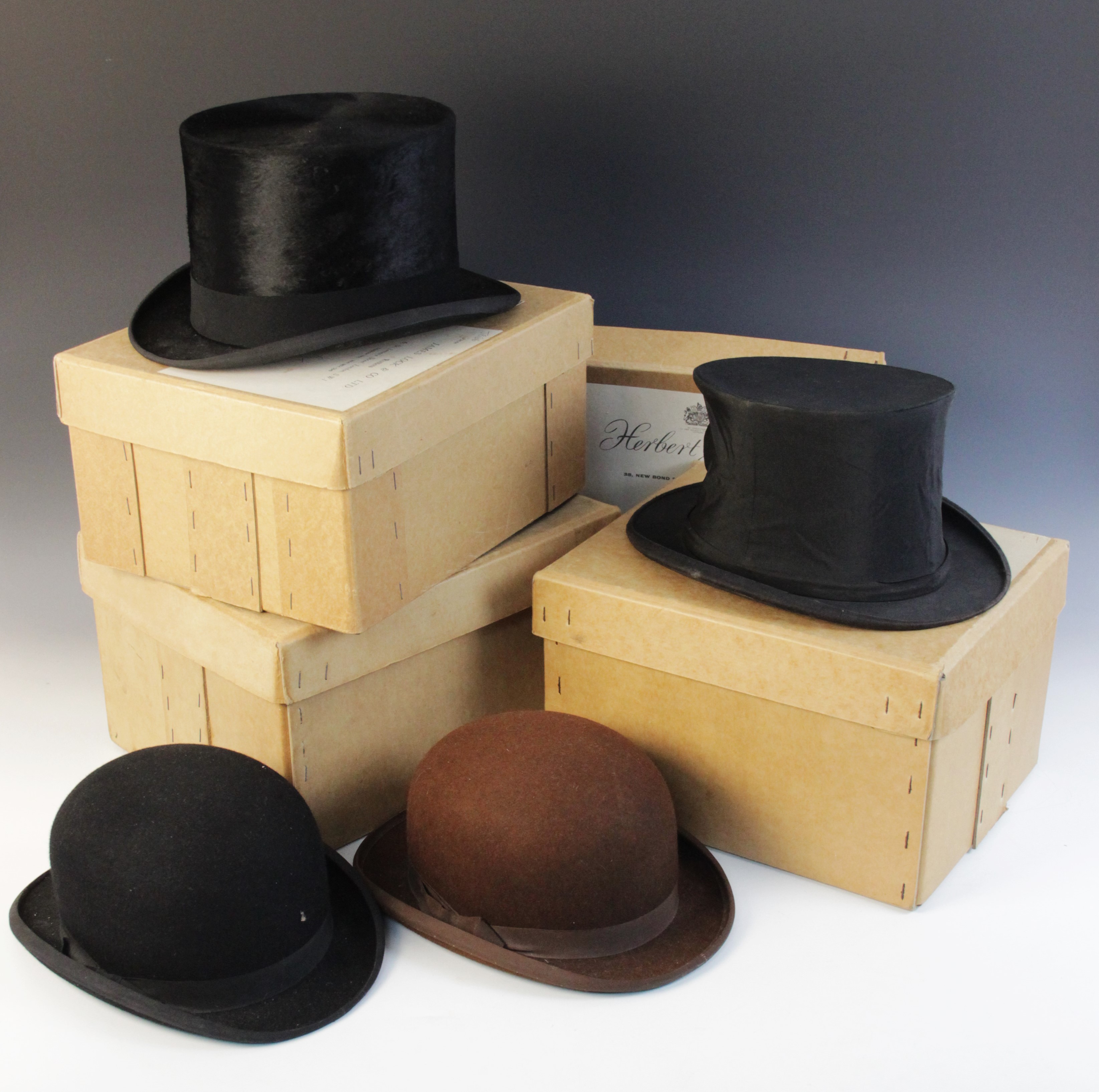 A collection of gentleman's ephemera to include; a Harrod's Ltd silk top hat, a Lincoln Bennett & Co