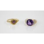 An amethyst and diamond 9ct gold dress ring, the central mixed cut amethyst measuring 10mm x 10mm,