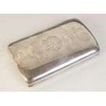 A Victorian silver cigar case, Howard James, Birmingham 1888, of curved rectangular form,