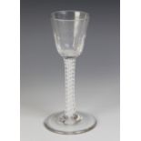 A round funnel bowl cordial glass, the basal fluted bowl on double series opaque twist stem