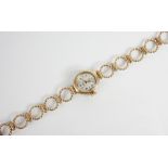 A lady's Rotary Maximus 9ct vintage wristwatch, the circular white dial with baton markers and