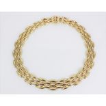 A Cartier Gentiane 18ct gold collar necklace, the torpedo link articulated chain with tongue and box