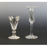 A cordial glass of small proportions, the flared conical bowl with annular shoulder knop, the stem