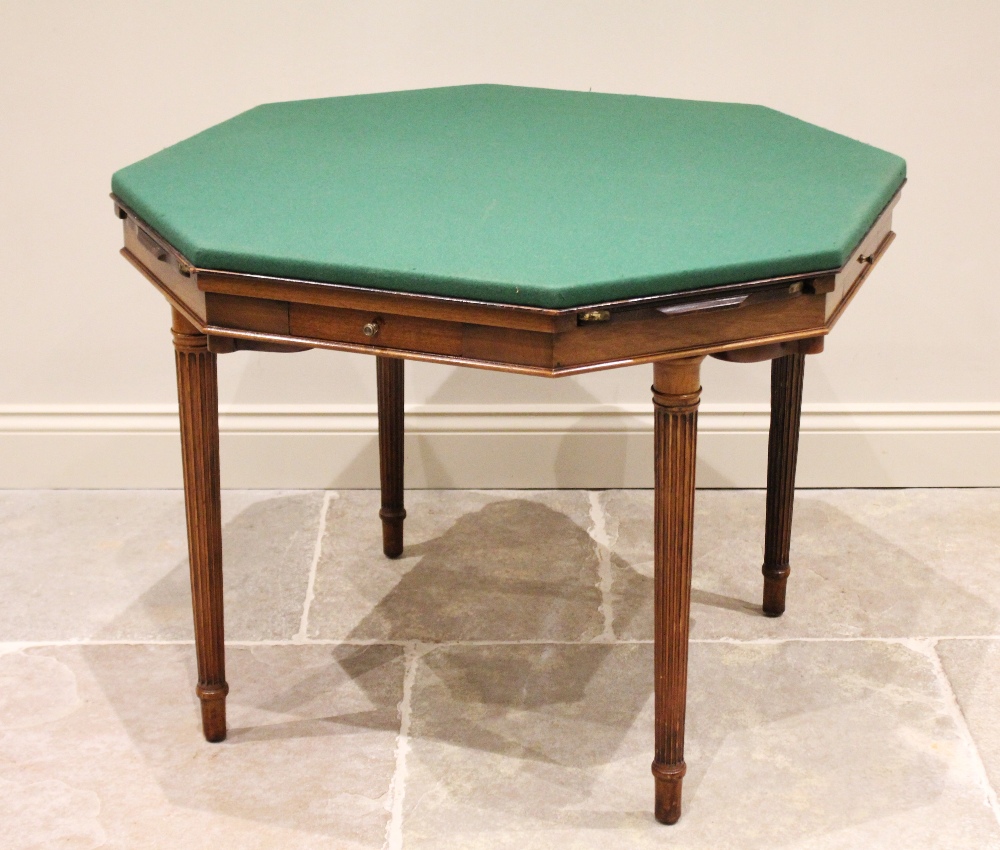 An early 20th century octagonal mahogany bridge table, by Trollope and Colls, London, with a - Bild 3 aus 4