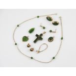 A selection of jade set jewellery, to include; A 14ct gold jade set chain, the 14ct gold rope