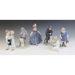 Six Royal Copenhagen figures modelled as children, comprising: a boy with a teddy bear (model 3468),