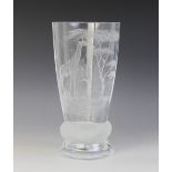 An African studio glass footed vase by John Munyaka, of faceted tapering form on cushion knop, the