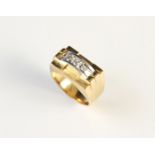 A French 18ct gold diamond set ring, of Odeonesque design, comprising three round brilliant cut