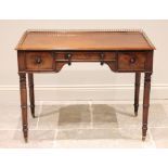 A mid 19th century mahogany side table, the rectangular moulded top with a three quarter pierced