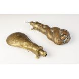 Two 19th century brass and copper powder flasks, each of typical pear form, one cast as an