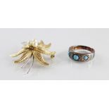 A turquoise set three-stone ring, comprising three turquoise cabochons measuring between 3mm and