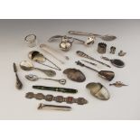 A selection of flatware and objects of virtue, to include a silver mounted miniature hand mirror,