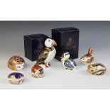 Five Royal Crown Derby paperweights, modelled as a hedgehog, a dormouse, a duckling, a ladybird