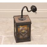 A Victorian coloured glass lantern, of rectangular form with a single hinged door, each panel