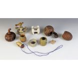 An East African Masai beaded ivory snuff bottle and a collection of South American items to
