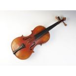 A violin, 19th century, the 33cm long body with two piece back, lacking bridge and chin rest and