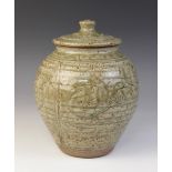 A Jim Malone (b.1946) stoneware vase and cover in green ash glaze, of inverted baluster form, the