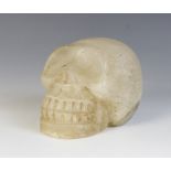 A Pre-Columbian style rock crystal skull, 9cm high