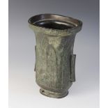 A Chinese bronze ritual wine vessel (Zun), decorated in the manner of late Shang-early Western