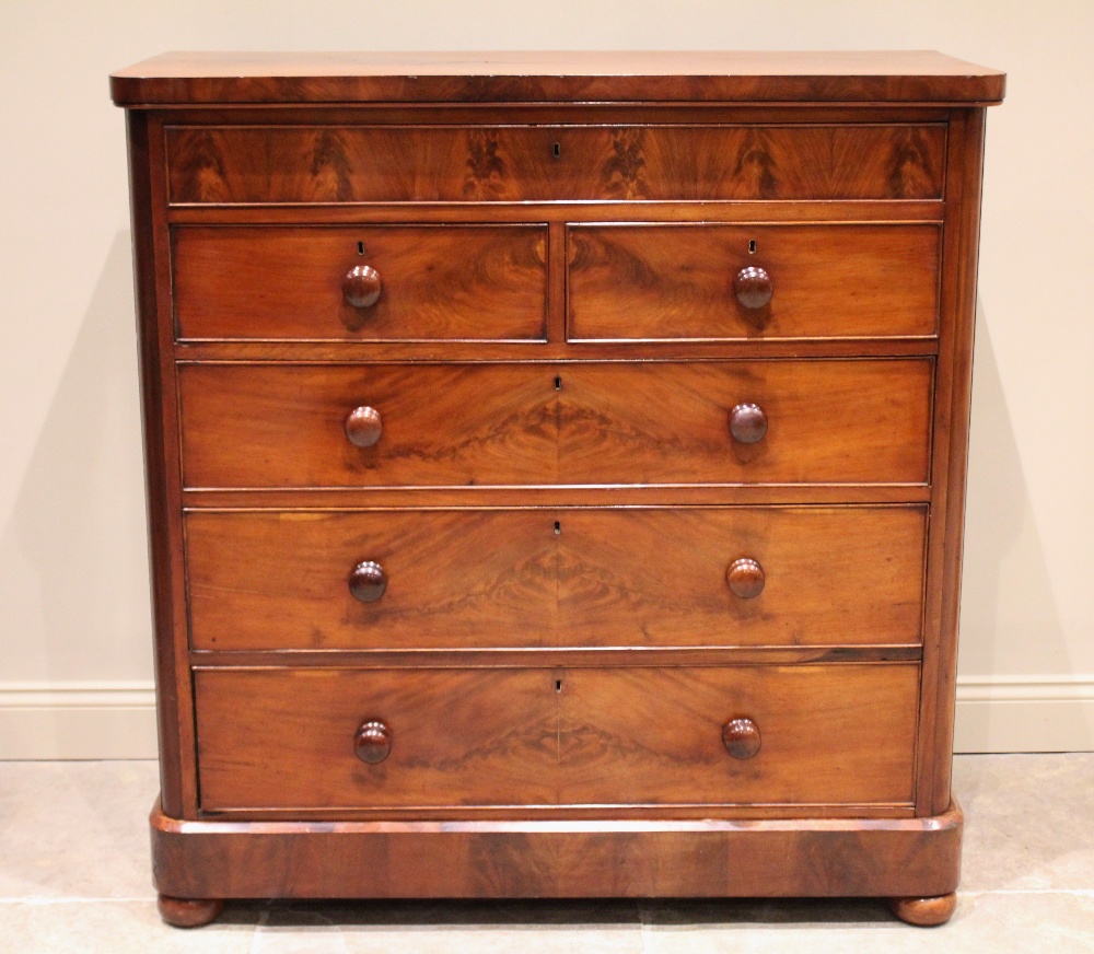A Scottish mahogany chest of two short over three long drawers, with secret frieze drawer and all