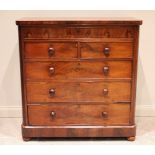 A Scottish mahogany chest of two short over three long drawers, with secret frieze drawer and all