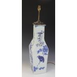 A Chinese porcelain blue and white lamp base, 19th/20th century, of baluster square section, applied
